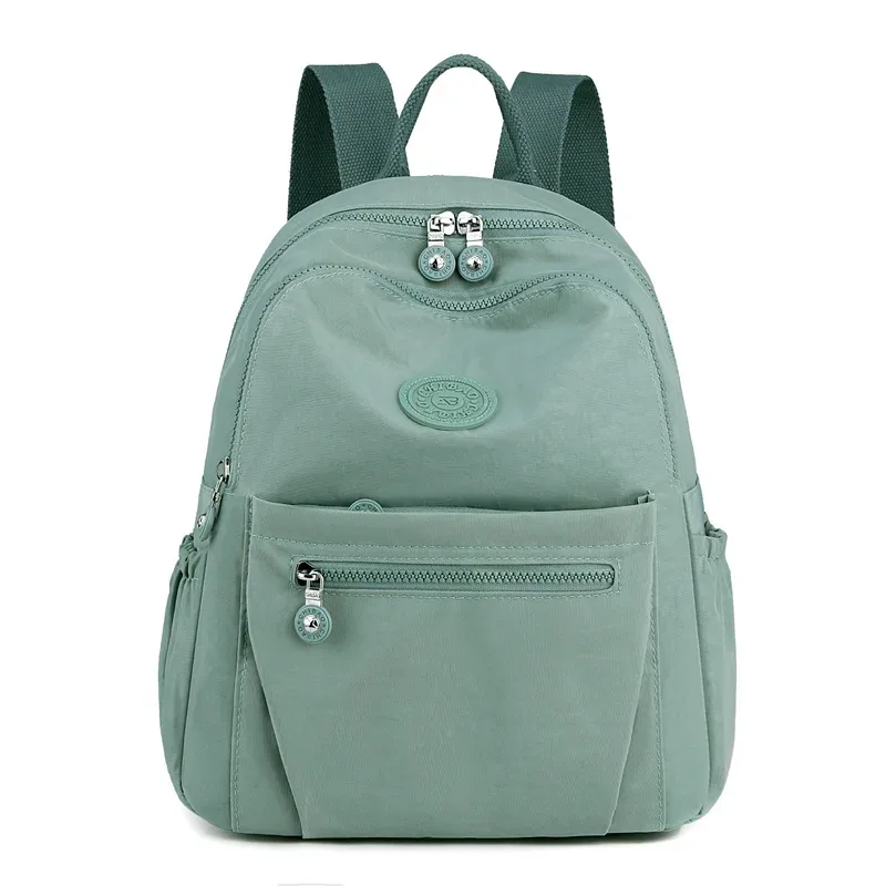 sac à dos léger en nylon pour femme, sac fourre-tout en nylon multi-poches, sac à dos décontracté imperméable pour les voyages, les trajets domicile-travail et l'usage quotidien
