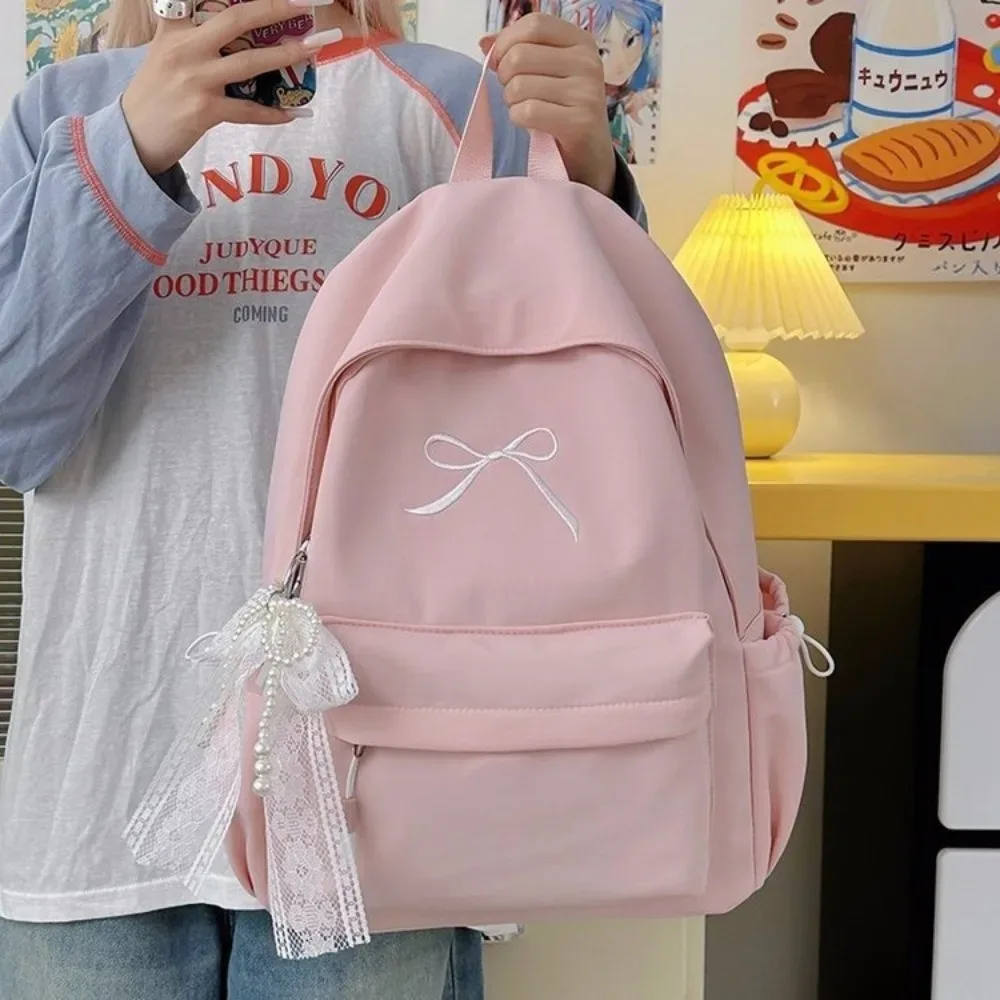 sac à dos portable pour filles avec nœud brodé, couleur unie, grande capacité, sac d'école pour étudiants, sac à dos de voyage léger en nylon