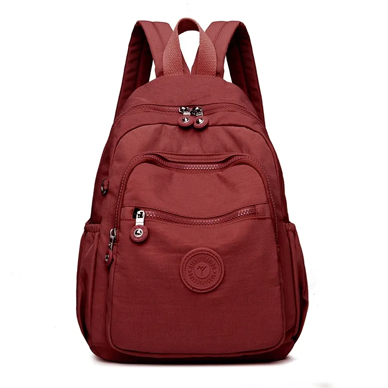 sac dos nylon unisexe noir poche latérale fermeture éclair doublure beige imprimé usage journalier
