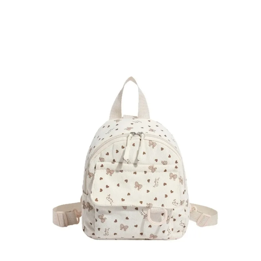 mini sac à dos en velours côtelé léger avec imprimé cœur et nœud, sac à dos décontracté multi-compartiments à ouverture zippée, sac à bandoulière de voyage