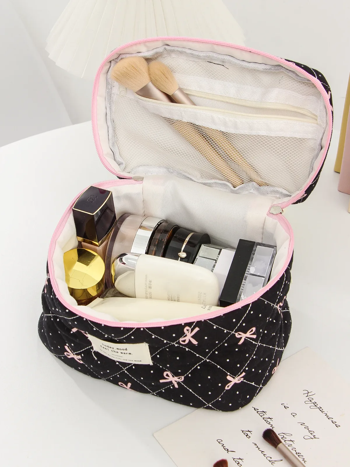 organisateur voyage polyester noir motif géométrique nœuds roses sac maquillage matelassé multifonctionnel cadeau vacances essentiel voyage