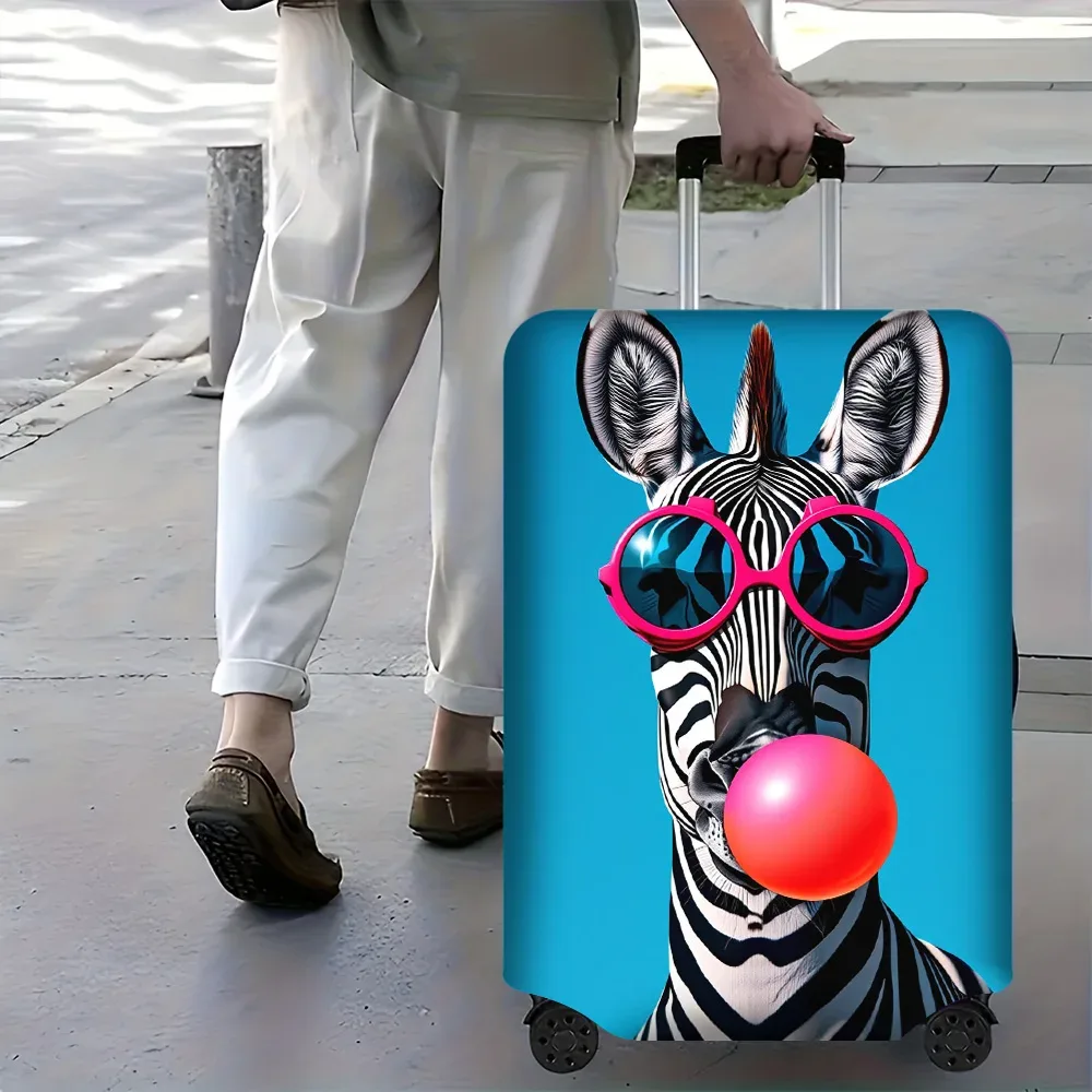 housse valise polyester motif zèbre lunettes bulles chewing gum bleu noire blanc voyage protection
