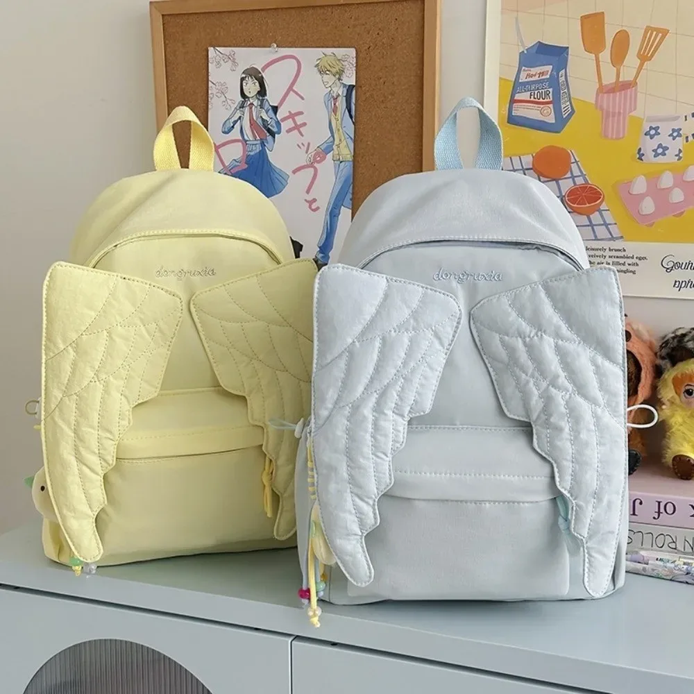 sac à dos polyvalent en forme d'aile d'ange, couleur unie, grande capacité, sac à dos en toile, style y2k, sac à bandoulière léger pour adultes et étudiants