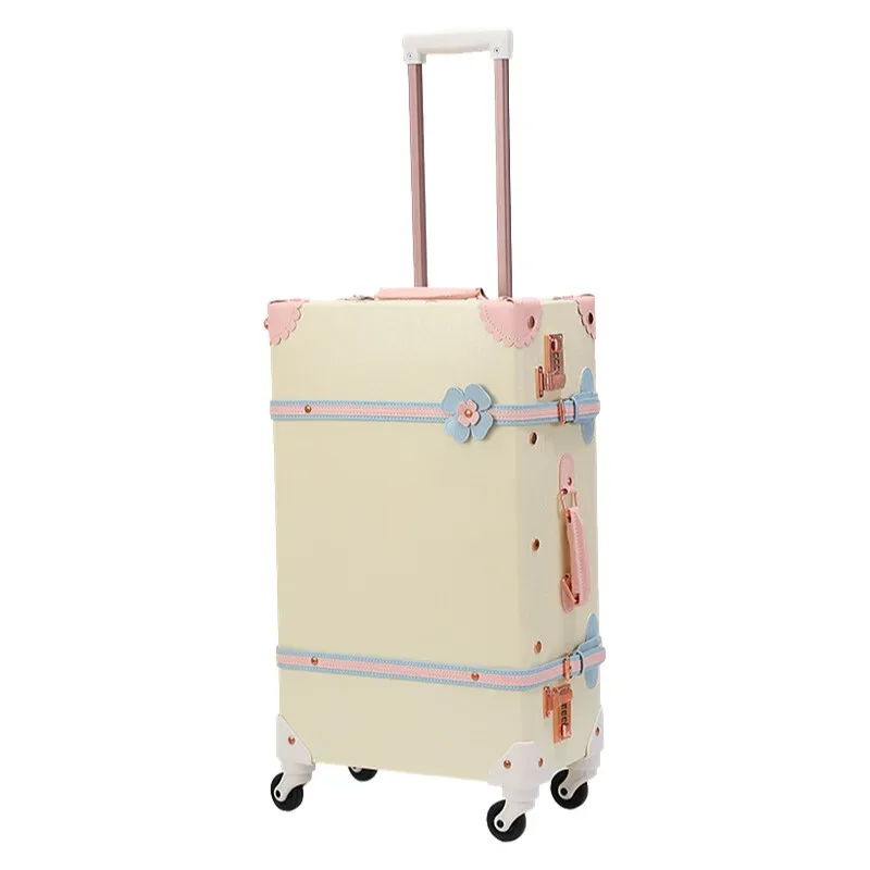 valise design rétro beige accents roses bleus motifs floraux poignée supérieure roulettes plastique dur voyage