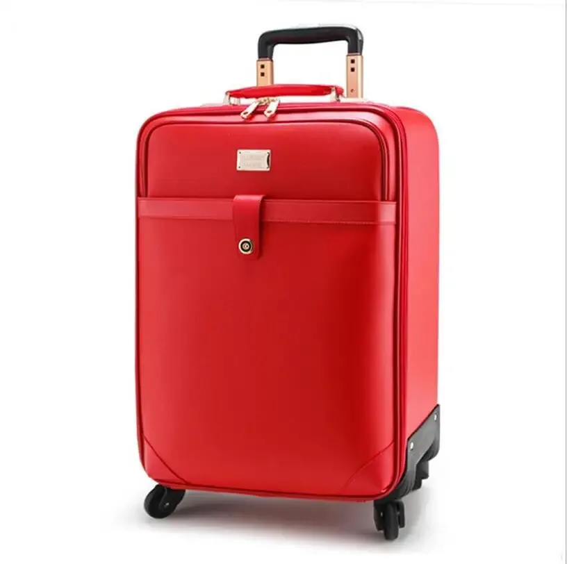 valise carrée cuir marron accents dorés roulettes quatre coins ceinture maintien intérieur marron affaires voyage