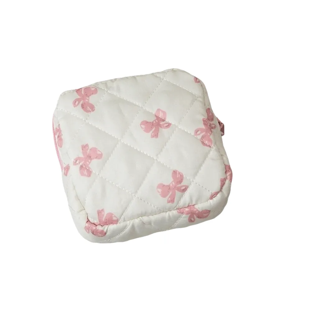 sac de rangement pour serviettes hygiéniques à motif à carreaux, sac cosmétique multifonctionnel, mini sac de voyage matelassé portable pour maquillage.