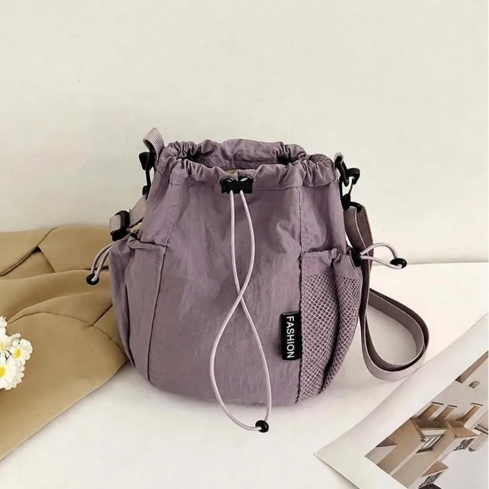 sac à bandoulière simple portable en nylon, petit sac léger de couleur unie pour l'extérieur