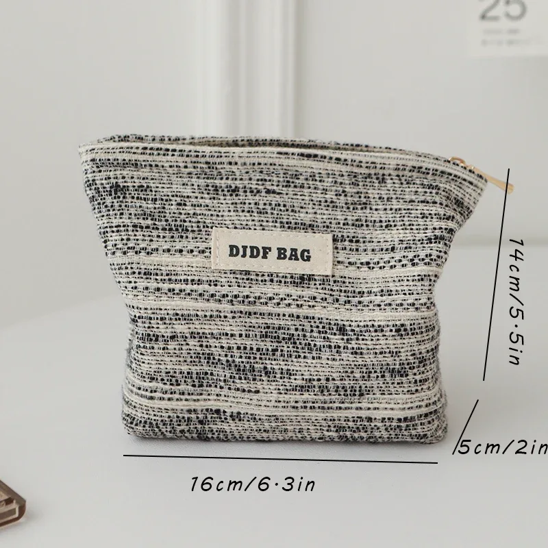trousse toilette polyester noir blanc motifs points zip doré format carré oreiller minimaliste cosmétiques voyage femmes