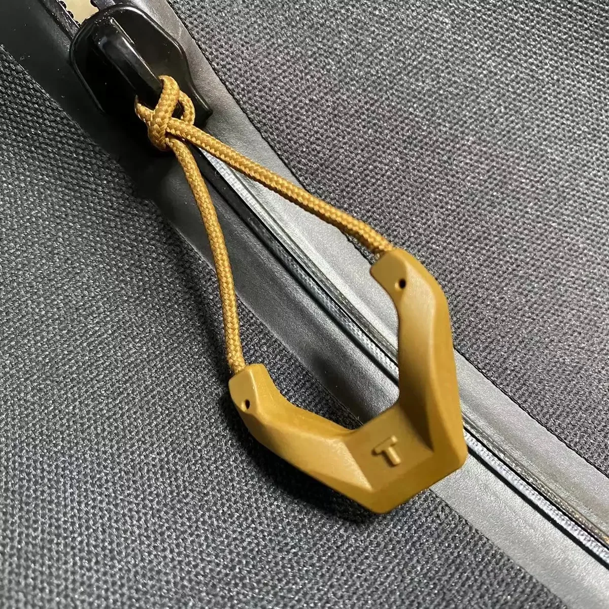 extracteur de fermeture éclair en tpu durable en forme de t multifonction pour l'extérieur, sac à dos tactique, sac de voyage, accessoires de corde arrière à fermeture éclair, 10 pièces/lot