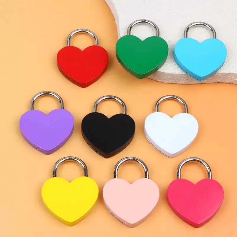 cadenas serrure tsa métal forme coeur couleurs vives marron dore rose rouge argent orange blanc usage voyage décoration objets personnels sécurité antivol
