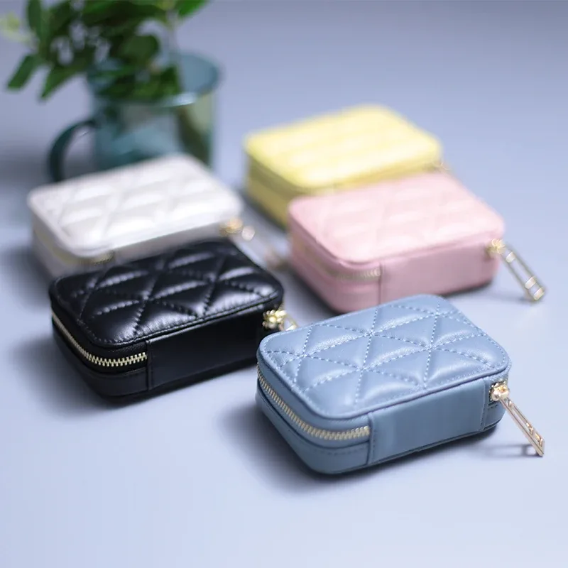 organisateur voyage cuir vache motif rayé blanc noir rose bleu carré zip décontracté cosmétiques maquillage