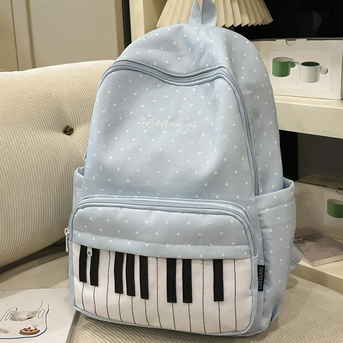 sac à dos décontracté en nylon de 16,9 pouces à pois avec motif clavier de piano et pendentif pour filles, idéal pour les voyages, le shopping et l'usage quotidien