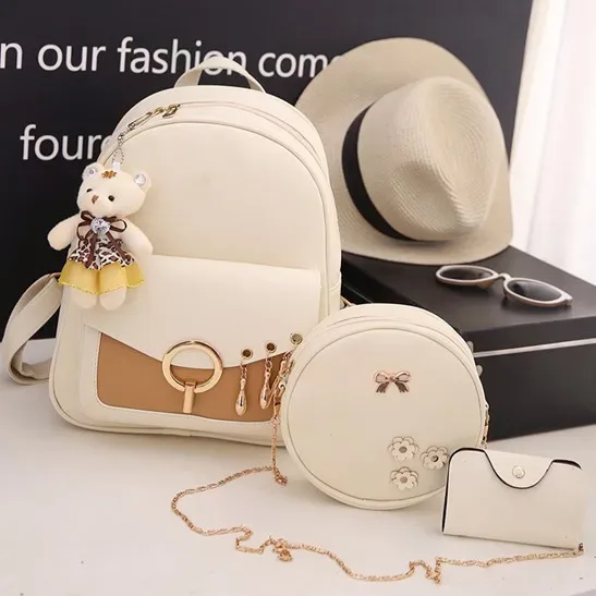 sac dos cuir synthétique gris motif géométrique relief bandoulière amovible porte-monnaie inclus voyage femme