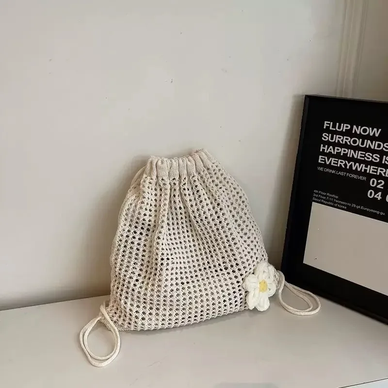 sac à dos en crochet pour femme avec cordon de serrage et motif marguerite, sac à bandoulière léger en tricot ajouré pour les voyages, la plage et l'usage quotidien