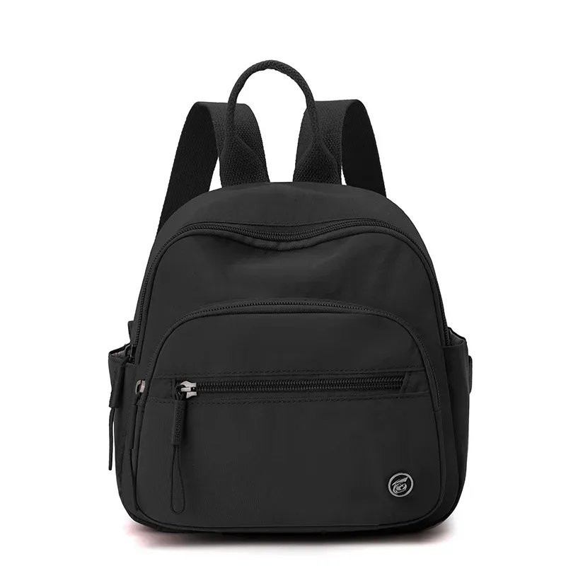 sac à dos portable en nylon pour femme, couleur unie, léger, multi-poches, décontracté, tendance, imperméable, nouveau cadeau 2026