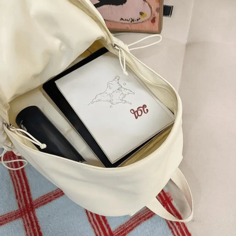 sac à dos polyvalent à ailes d'ange, couleur unie, grande capacité, en nylon, style y2k, sac à dos léger en toile pour adultes et étudiants