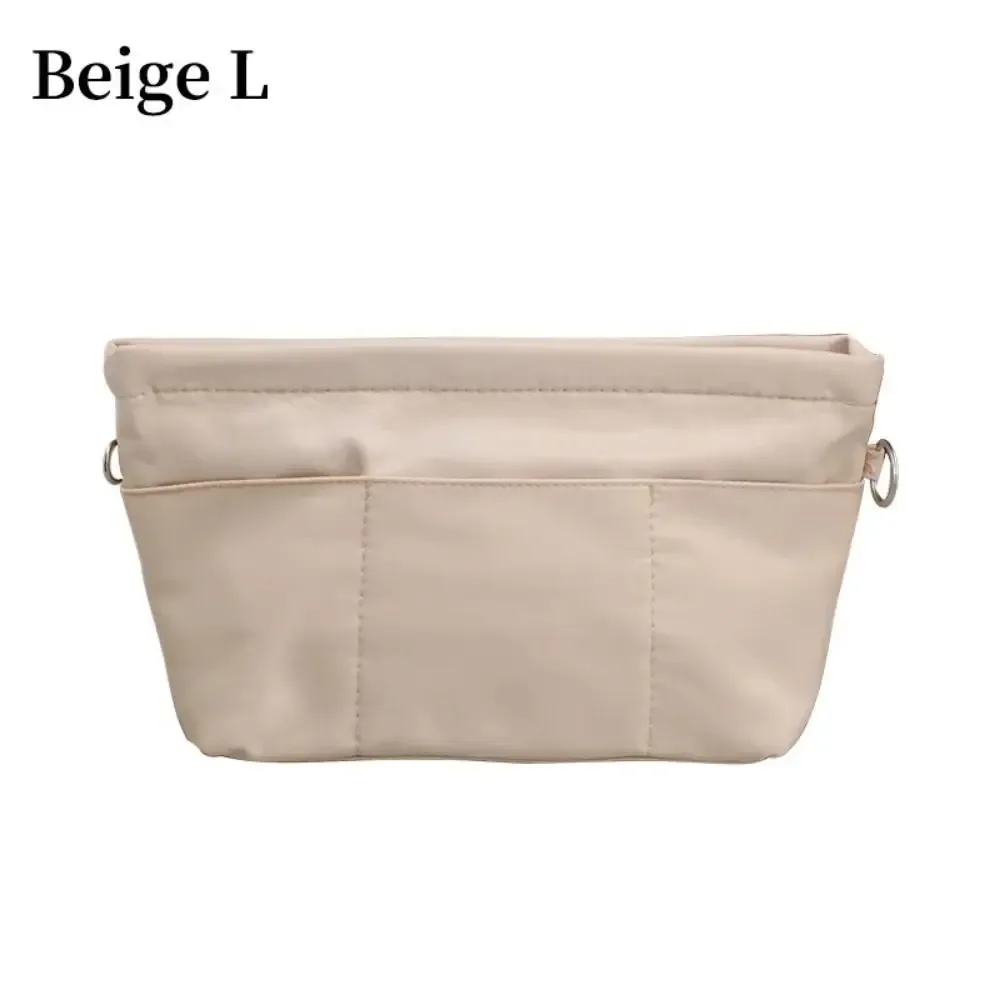 organisateur voyage nylon beige multipoches accessoires maquillage transport portable compartiments séparés poignée supérieure capacité grande