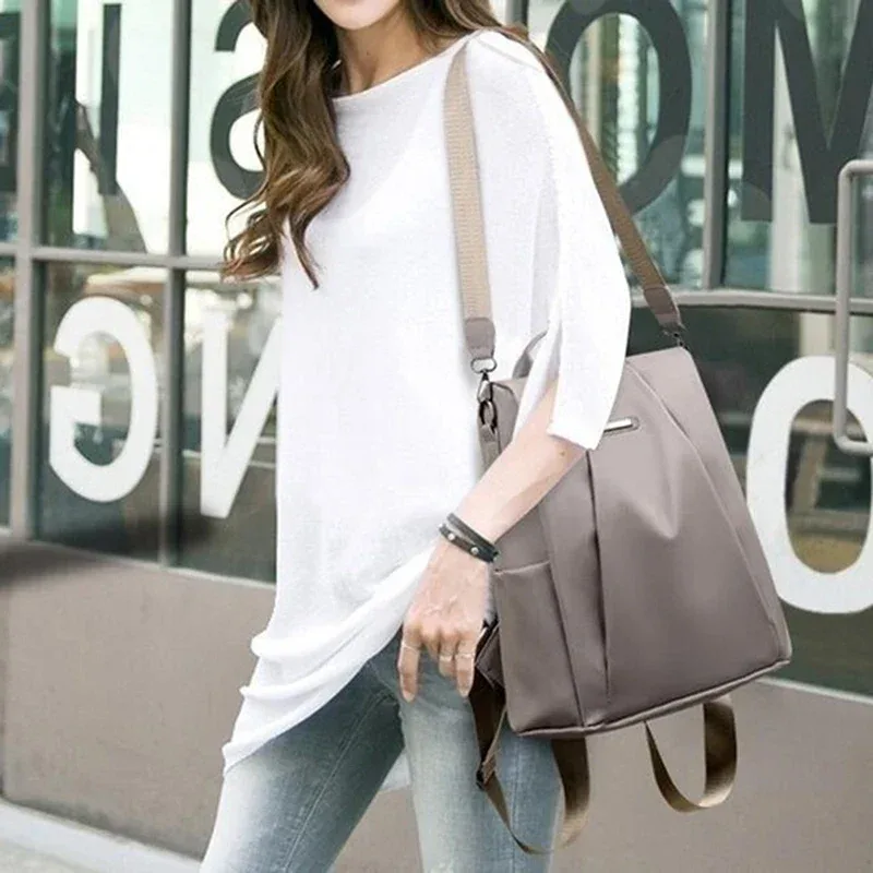 sac à dos multifonction pour femmes, sac d'école décontracté en nylon de couleur unie pour filles, sac à bandoulière de voyage à la mode avec sangle détachable