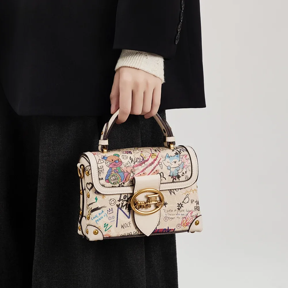 sac à main rétro graffiti avancé pour femmes, nouveau design de niche 2026, imprimé polyvalent, sac à bandoulière tendance.