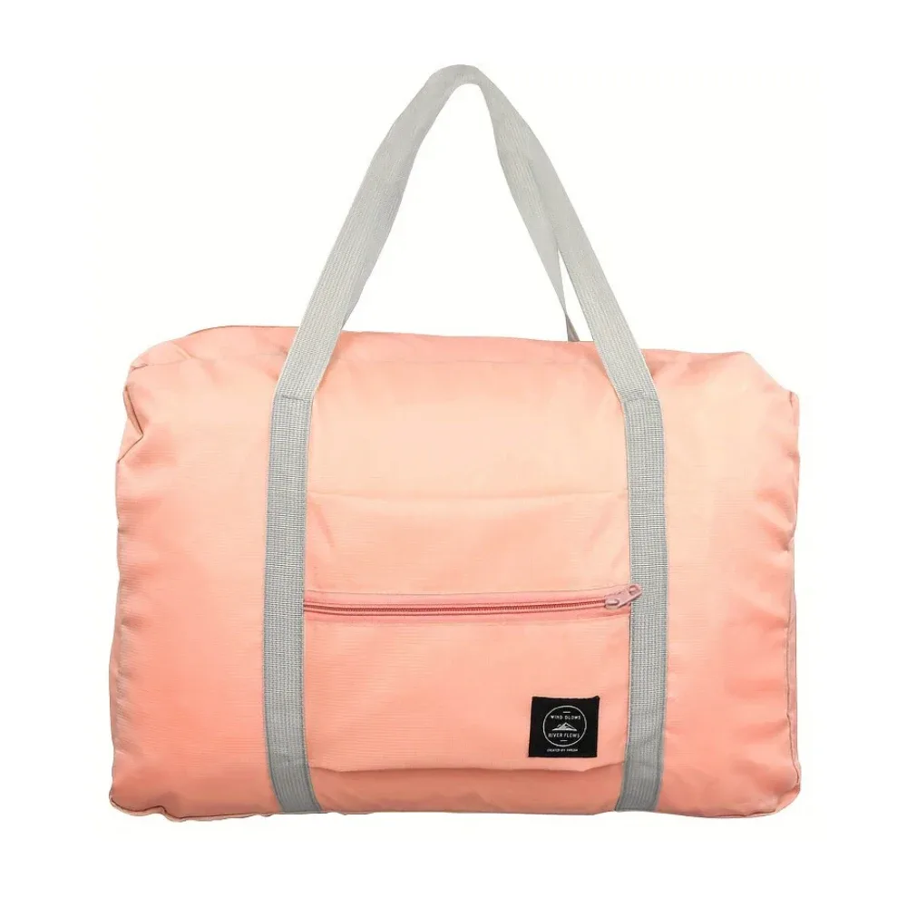 sac de voyage pliable de grande capacité, imperméable et résistant à l'usure, peut être porté à la main et stocké sur une épaule à la maison.