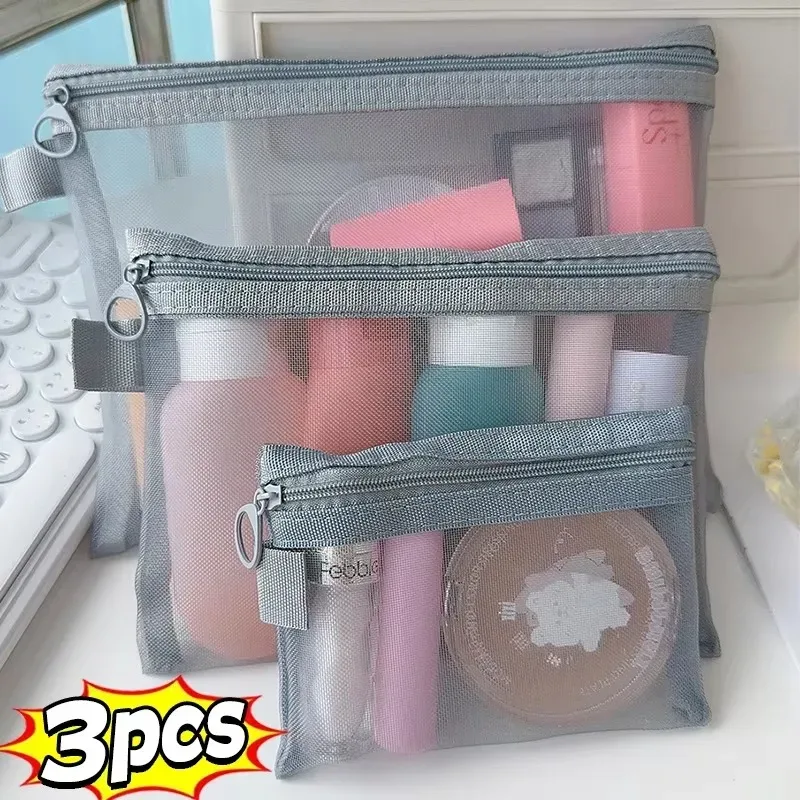 trousse toilette nylon transparent poches grises maquillage fard rouge lèvres brosse sac voyage décontracté
