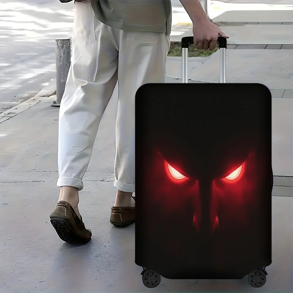 housse valise polyester motif œil rouge fond noir blanc poignées roulettes protection voyage compacte tripode