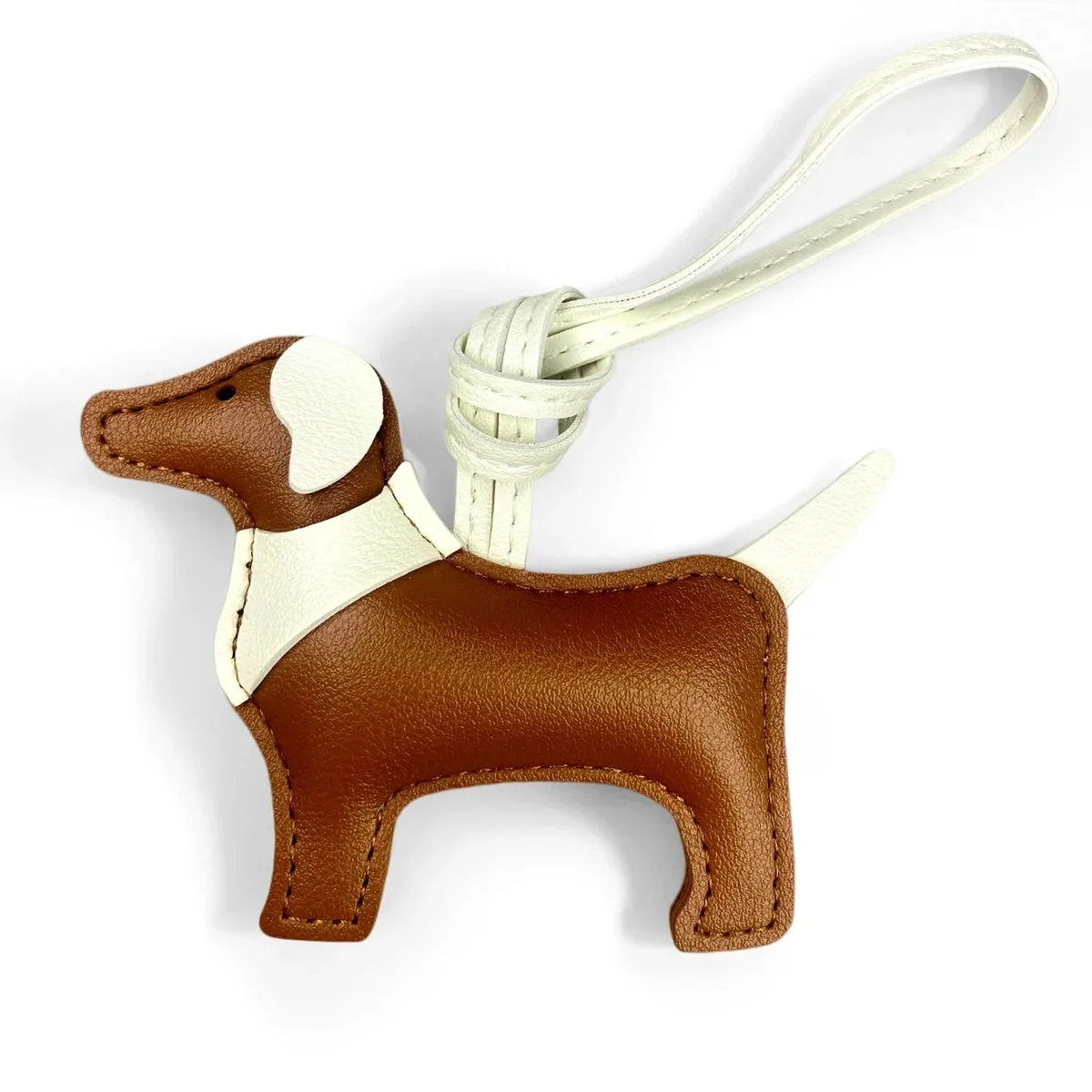 sac dos cuir motif chien silhouette orelles criniere couleurs contrastantes ornements voyage usage journee accessoires sac main porte clefs