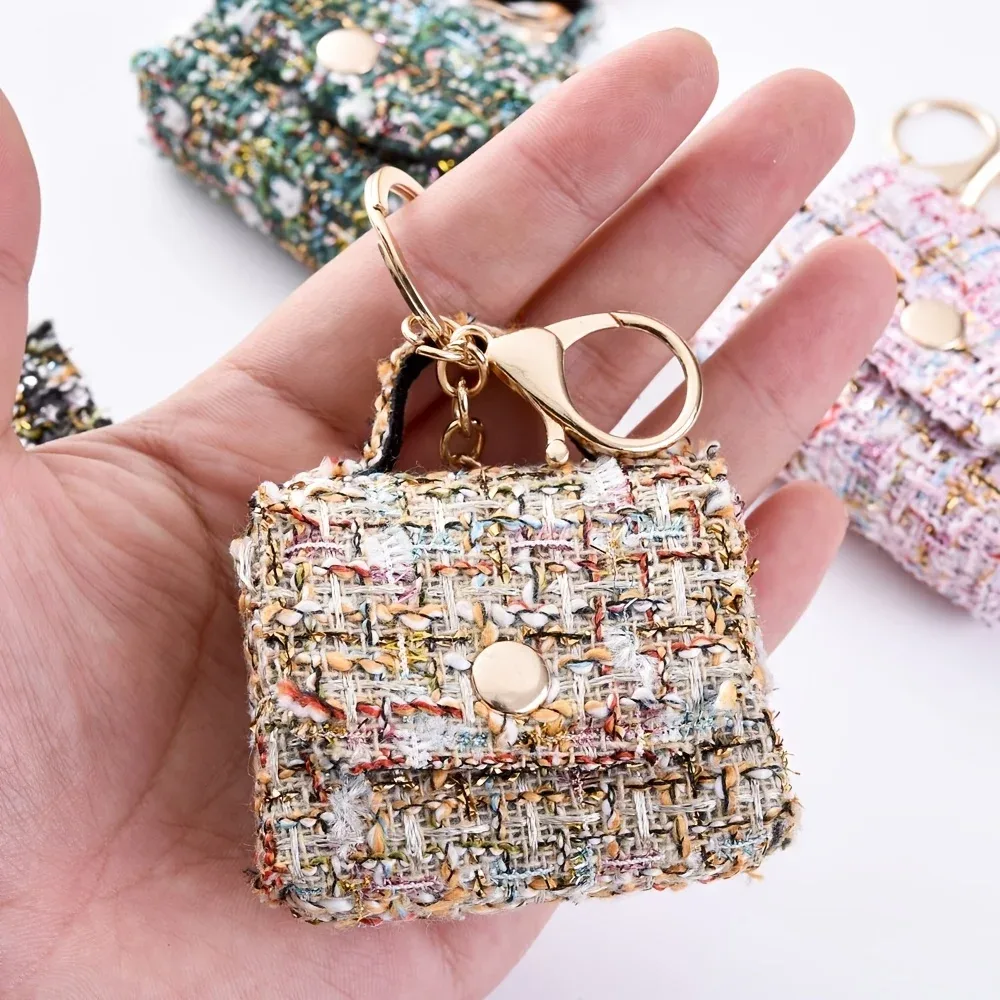 porte clés sac mini tweed bleu rose noir poignée métallique dorée monnaie écouteurs accessoire voyage compact