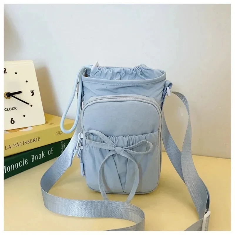 nouveau sac bandoulière léger pour téléphone portable pour femme, sac de sport extérieur, sac de cyclisme, porte-bouteille d'eau, sac de voyage, design à nœuds