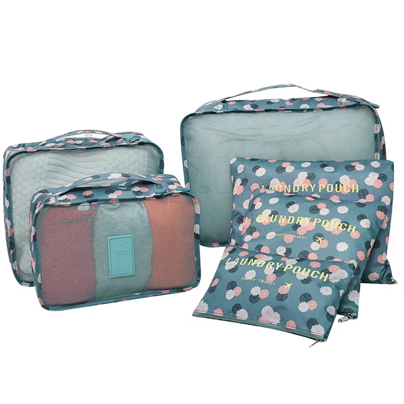 organisateur voyage polyester bleu transparent rectangulaire poignée intégrée fleurs léopard motif lettre format rangement vêtements chaussures compression