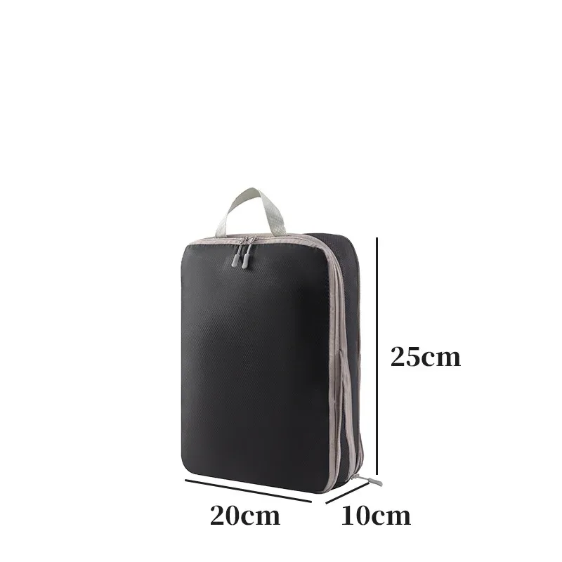 organisateur voyage polyester blanc bandes grises format rectangulaire poignées grises compression vêtements articles toilette rangement valise