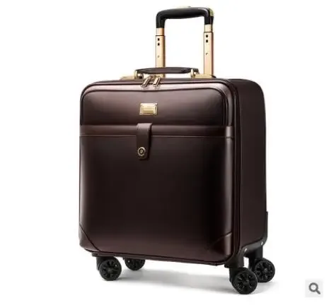 valise carrée cuir marron accents dorés roulettes quatre coins ceinture maintien intérieur marron affaires voyage