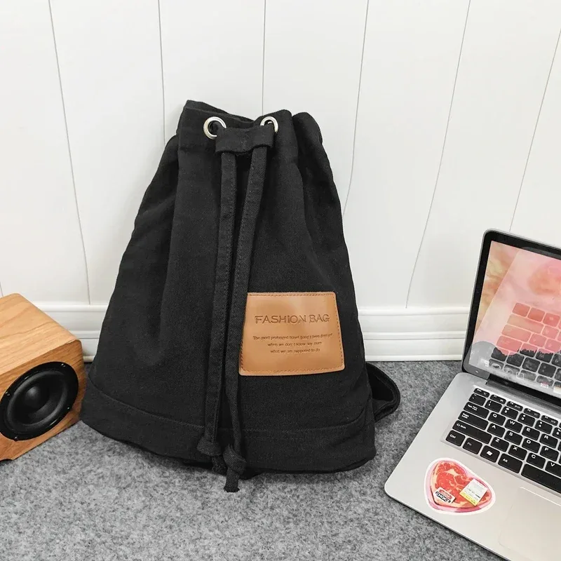 sac d'école solide décontracté, sac à dos en toile à la mode, sac à dos de grande capacité pour les déplacements, sac de voyage pour étudiants, nouvelle collection 2026