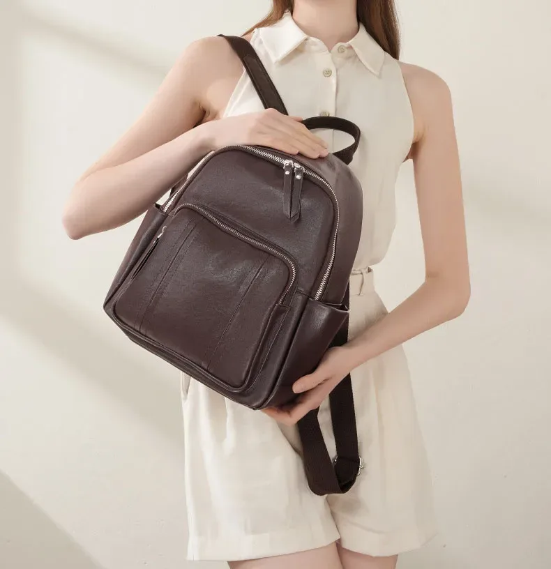 sac dos cuir vache marron noir femme voyage compartiment imperméable poche latérale zippée courbe dos décontracté