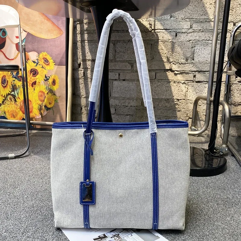 sacs fourre-tout de grande capacité pour les sacs à main et sac à main de concepteur de luxe 2025 nouveau dans décoration à paillettes sur le bouton sac à bandoulière en tissu des sous-bras haute qualité