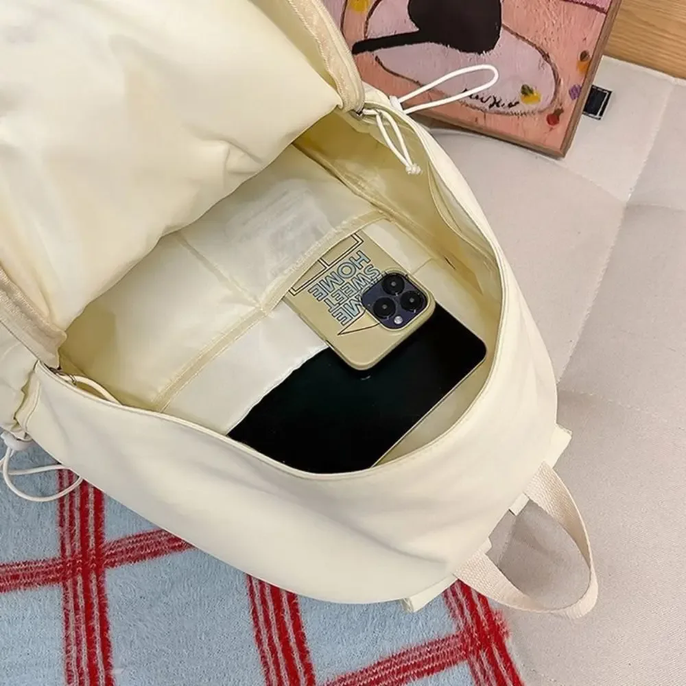 sac à dos polyvalent à ailes d'ange, couleur unie, grande capacité, en nylon, style y2k, sac à dos léger en toile pour adultes et étudiants