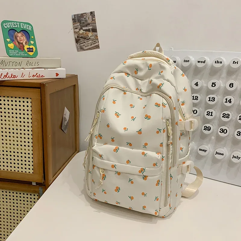 sac à dos décontracté à imprimé floral grande capacité pour filles, sac d'école en nylon imperméable, capacité pour ordinateur portable 14 pouces, style frais et doux
