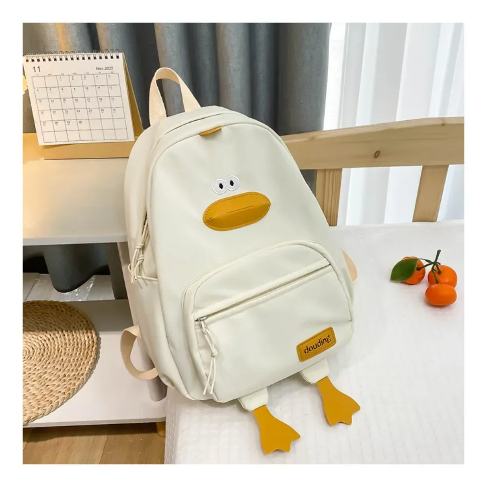 sac de voyage en nylon avec motif de canard de dessin animé, sac à dos à 3 couches avec poches zippées pour tout-petits, sac d'école de grande capacité pour étudiants et filles