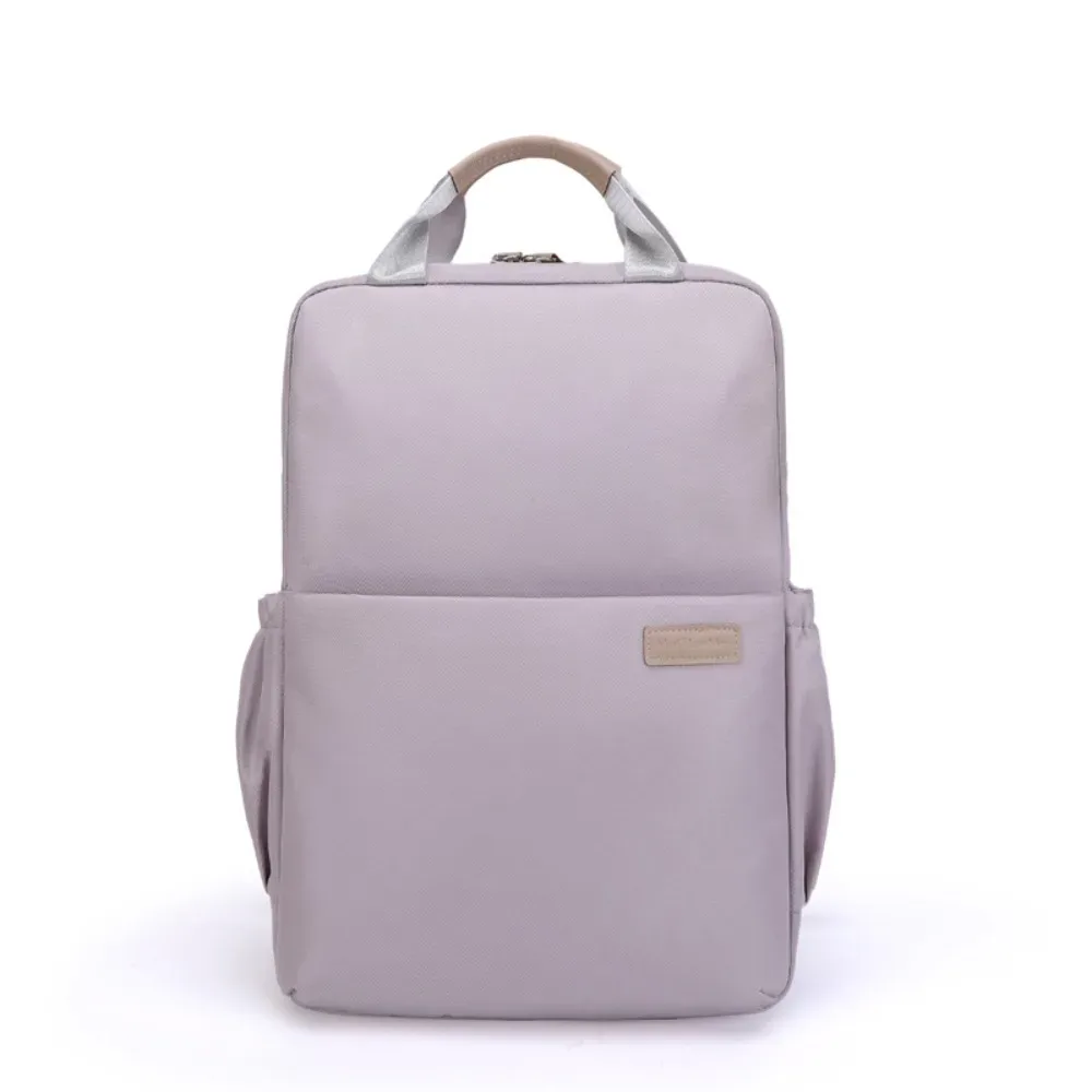 sac dos nylon bleu rose pâle noir antichoc imperméable poche téléphone épaules confortables usage voyage école