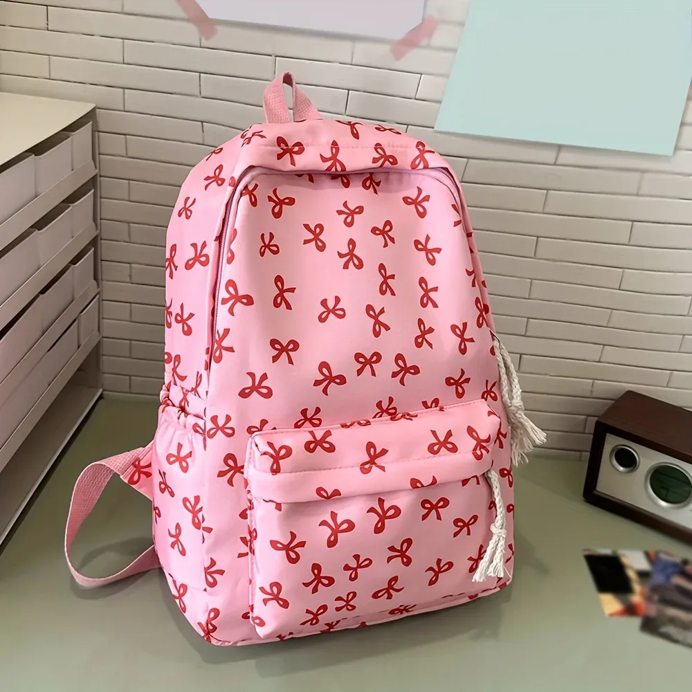 sac à dos tendance et mignon à imprimé nœud pour femme, compartiment pour ordinateur portable avec bretelles réglables, sac idéal pour la rentrée scolaire et les voyages sur le campus