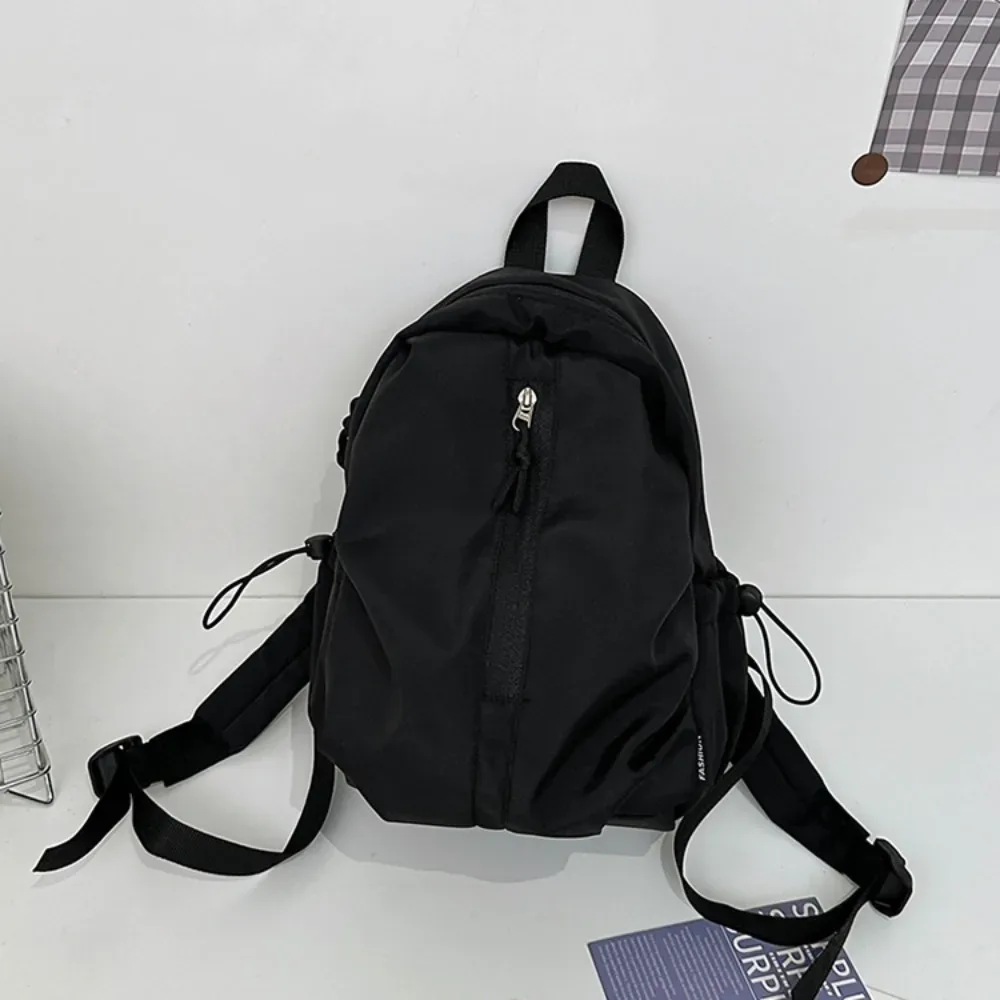 nouveau sac à dos simple de grande capacité, léger et étanche, sac à dos de randonnée avec fermeture éclair, couleur unie, sac d'université pour l'extérieur