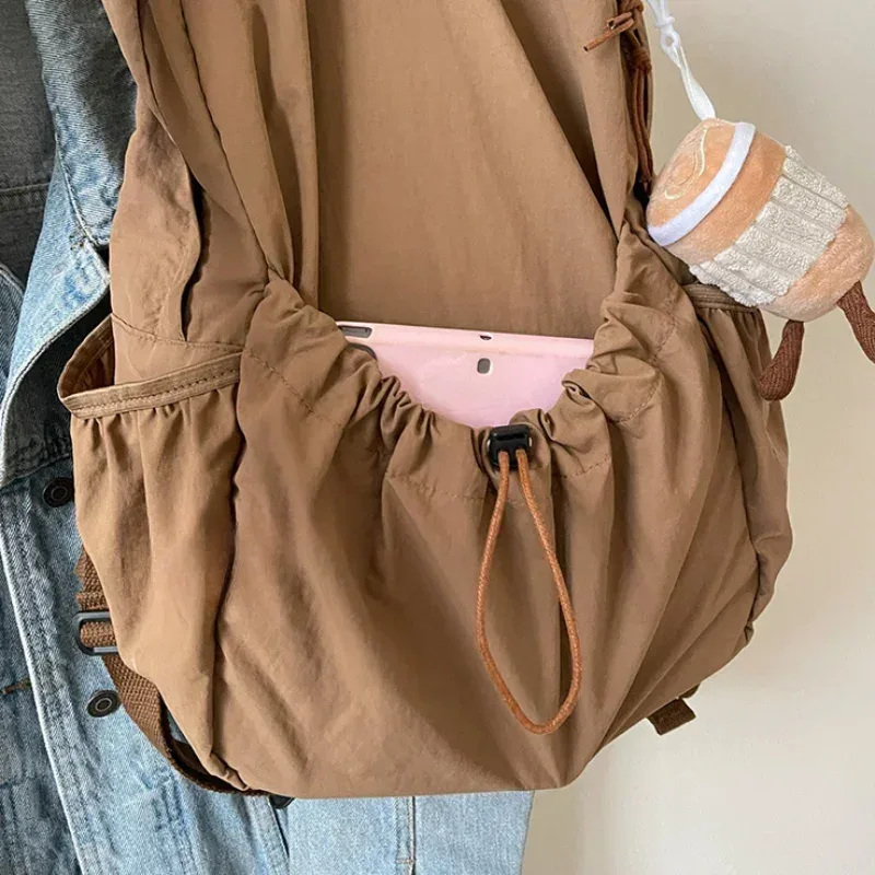 sac dos nylon beige pliant grande capacité voyage étudiant lycée scolaire pli cartable sac dos