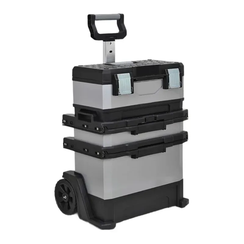 valise aluminium grise roulettes fixes poignées bleues compartiments superposés transport voyage travaux hausse atelier
