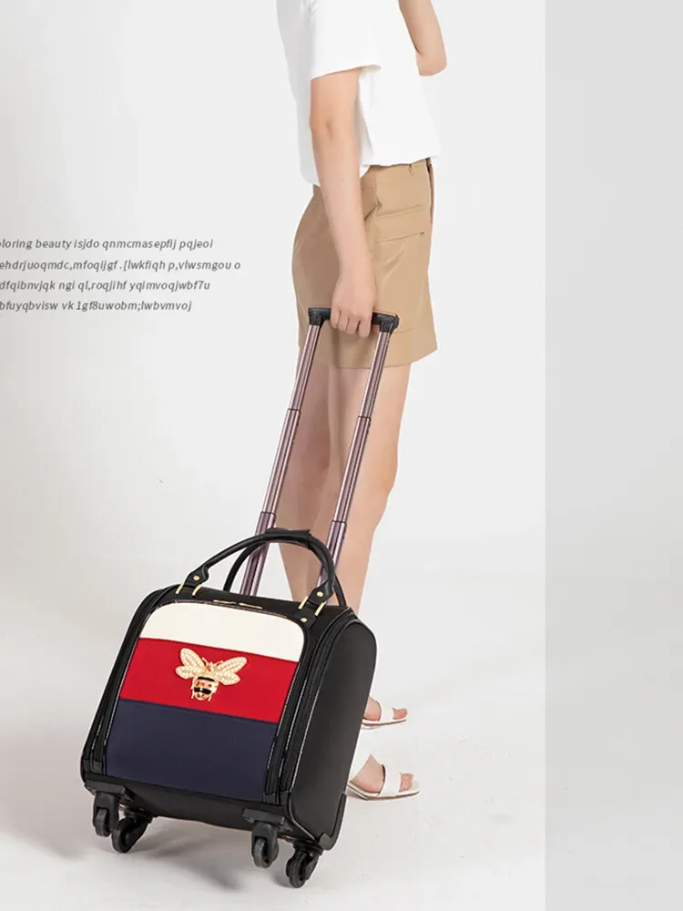 sac voyage toile motif couleur noire blanche rouge bleu abeille rétro compact elégant roulettes toupie poignées latérales supérieure