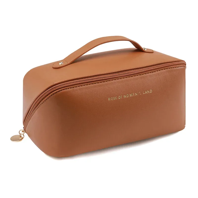 trousse de maquillage pratique et à la mode en pu, sac de rangement de voyage, trousse de toilette de grande capacité, trousse de maquillage pour oreiller de beauté stimulant les mains