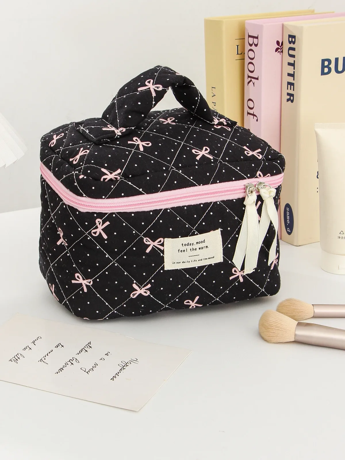 organisateur voyage polyester noir motif géométrique nœuds roses sac maquillage matelassé multifonctionnel cadeau vacances essentiel voyage