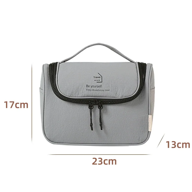 sac de toilette en taslon, imperméable pour voyage, sac de maquillage portable pour femmes, grand espace de rangement pour articles de toilette.