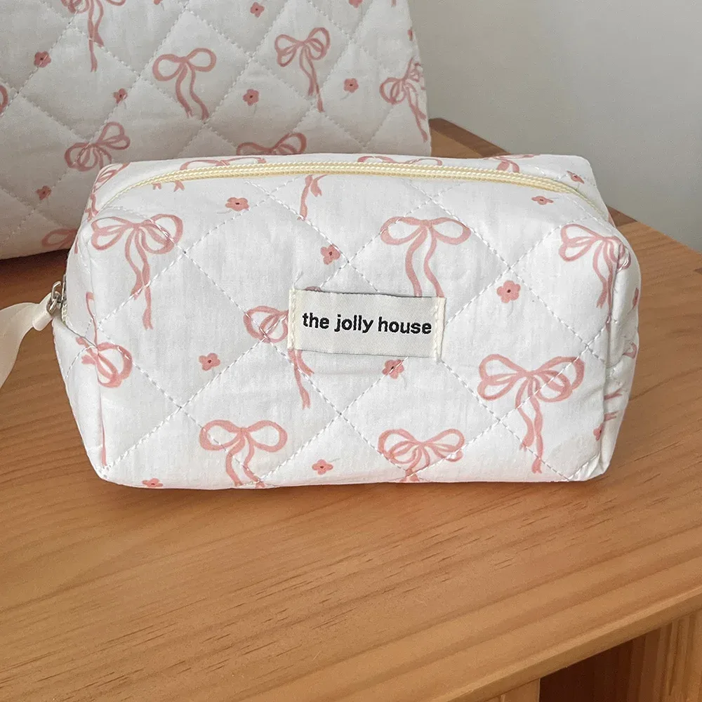 sac de maquillage matelassé avec nœud papillon pour femmes, fourre-tout portable, pochette de rangement de cosmétiques et de toilette, sac à main à fleurs avec fermeture éclair, vente en gros