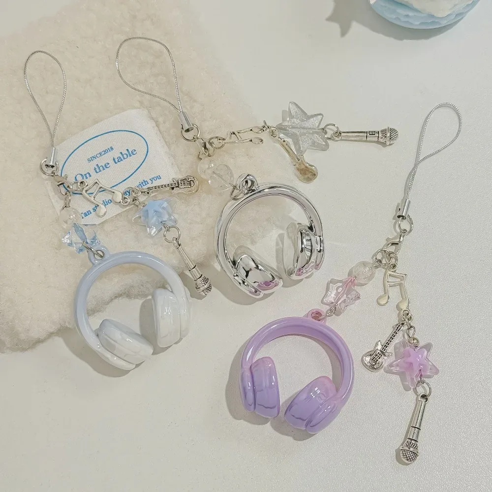 porte clé musical chaine métal accoutrements musicaux petit pendentif créatif voyage sac main pods casque bouton poussoir écouteurs accessoire voyage