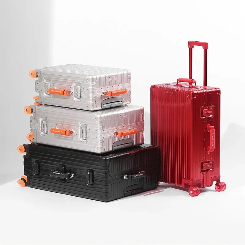valise aluminium argenté roulettes oranges toupies ergonomiques poignées verticales voyage affaires élégante robuste durables